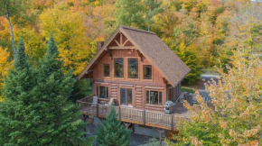 Log Cabin Home with Lake and Mountain view by Reserver.ca Sainte-Adele